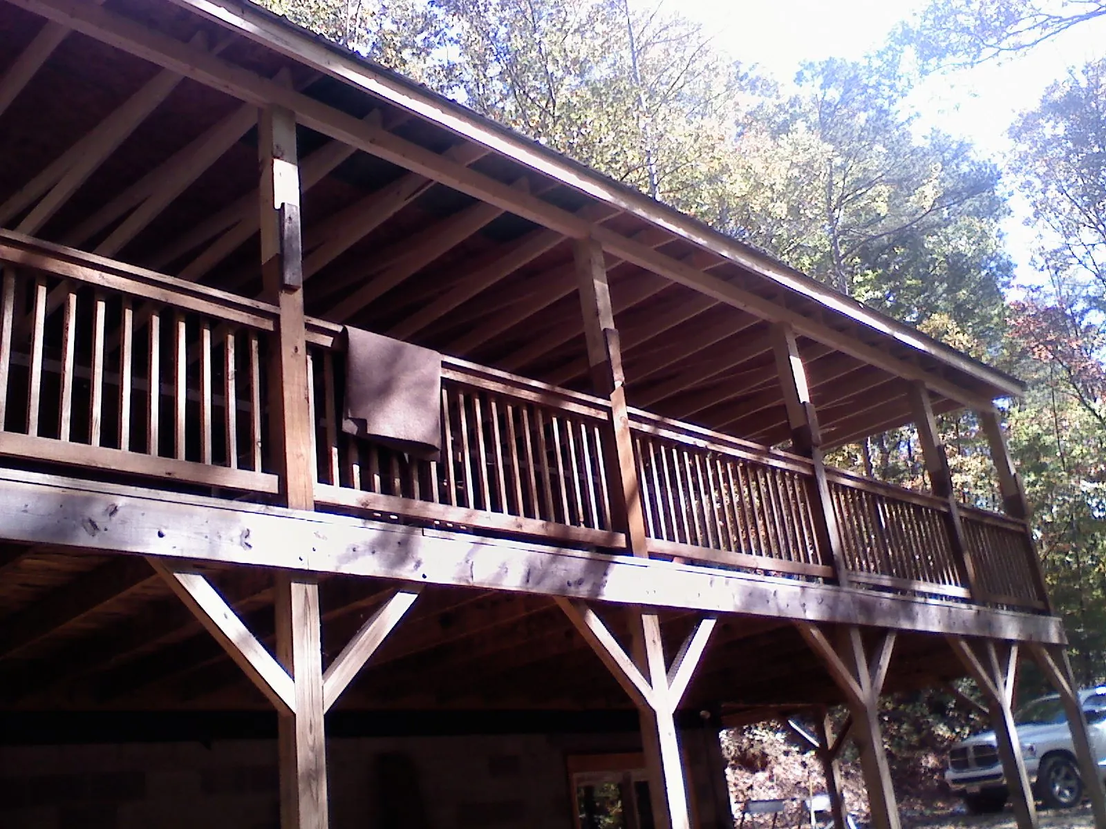 Timber framing under a new elevated porch and deck — Roof Leak Repair in White by Roofing Brothers